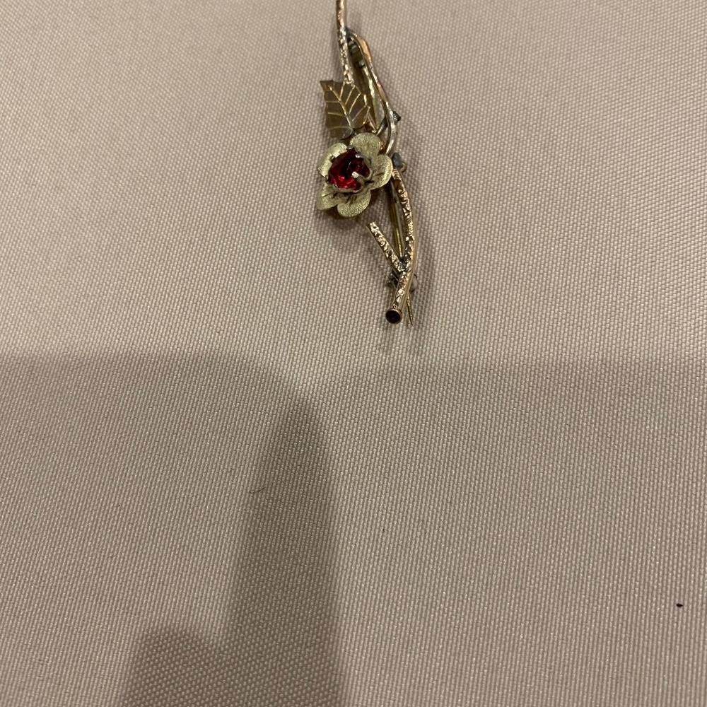 Goldtone Floral Bar Pin W/ Red (garnet?) Rhinestone in Center  Vintage